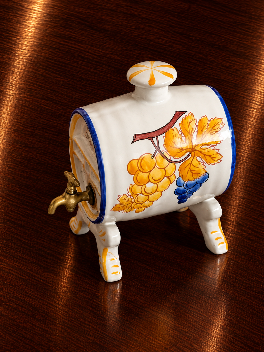 ⁩ A hand-painted ceramic and brass cognac barrel decanter by Alfred Renoleau. ⁨📐20cm